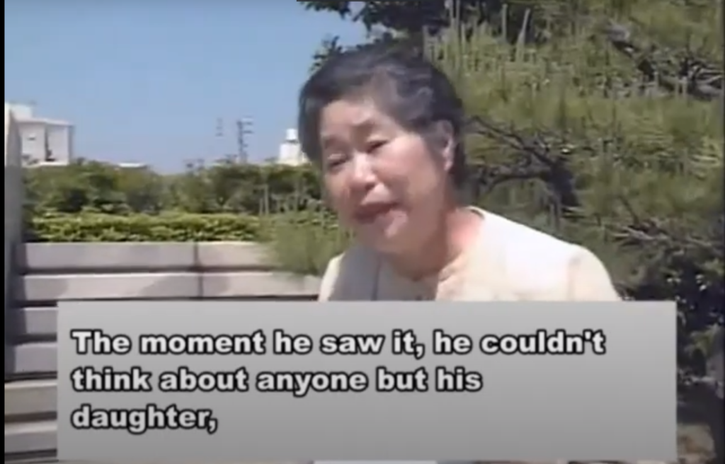 A screenshot of a Japanese woman giving her testimony