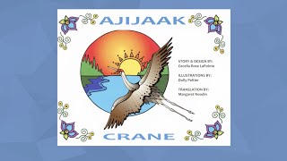 Cover of "Ajijaak -- Crane". Features an illustration of a crane flying over a sunset.