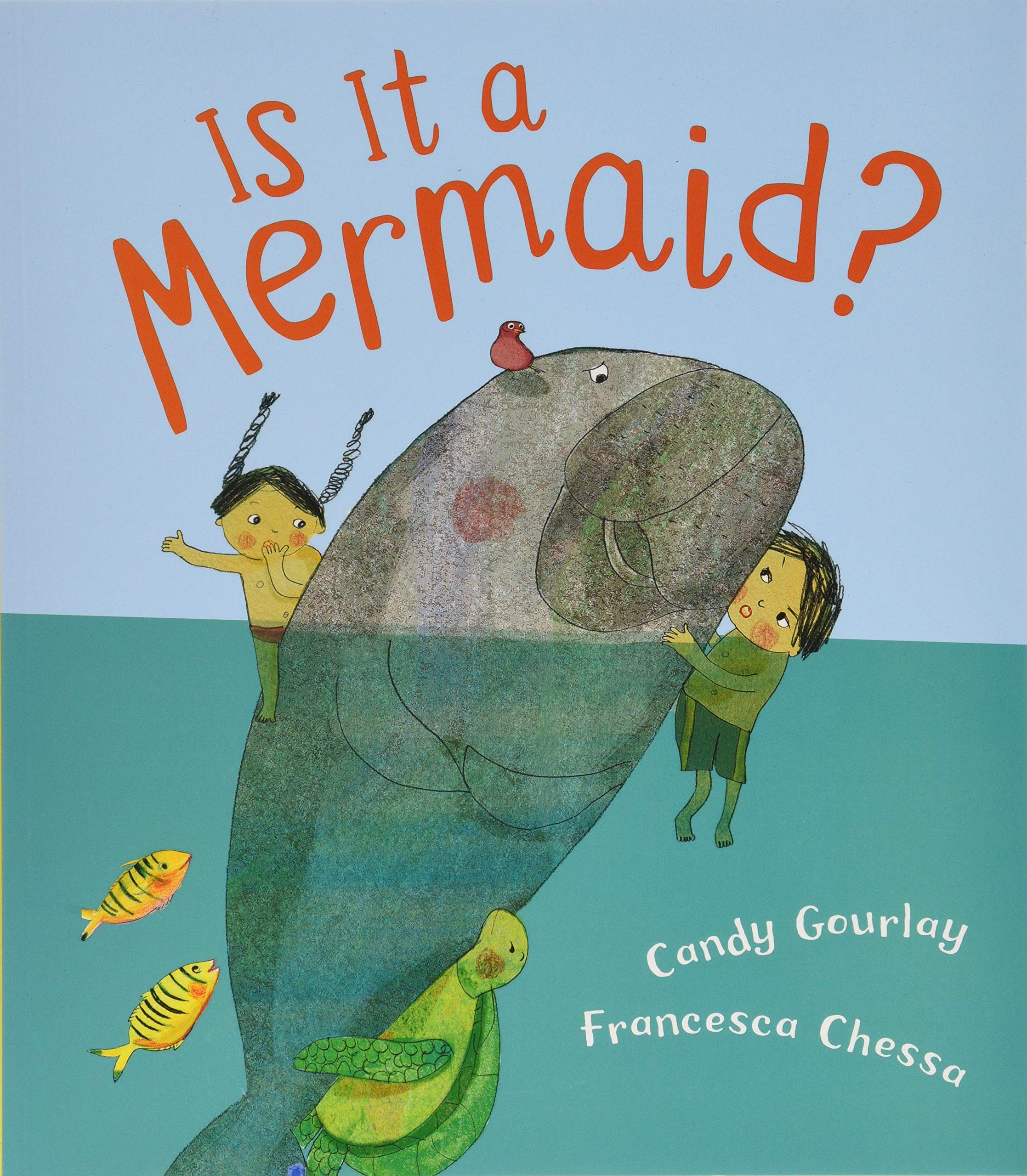 Cover of the book Is It A Mermaid? Features the two protagonist clinging to a swimming dugong. Two fish and a turtle are swimming along as well.